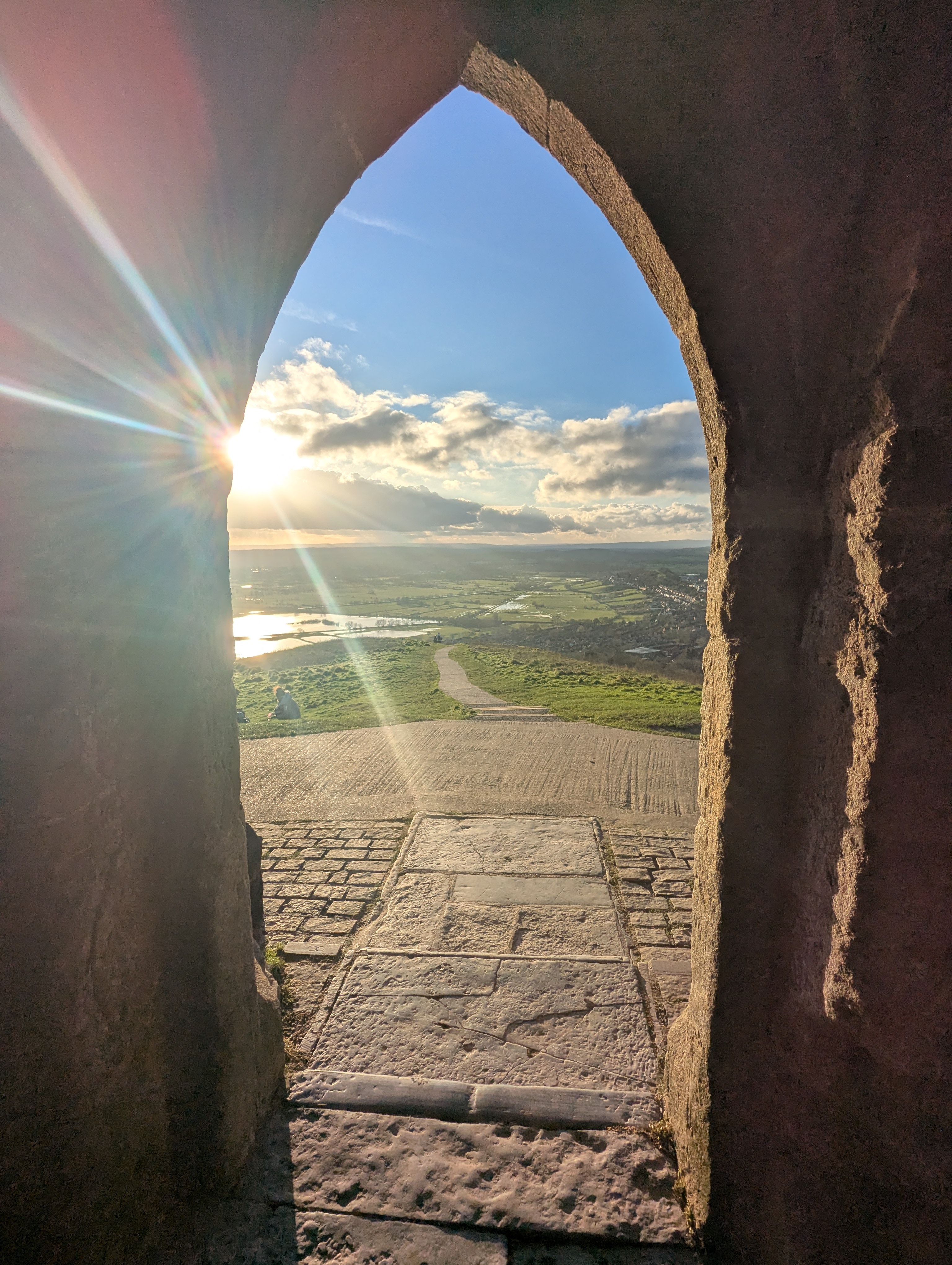 Sunlight through the Glastonbury Tor arch